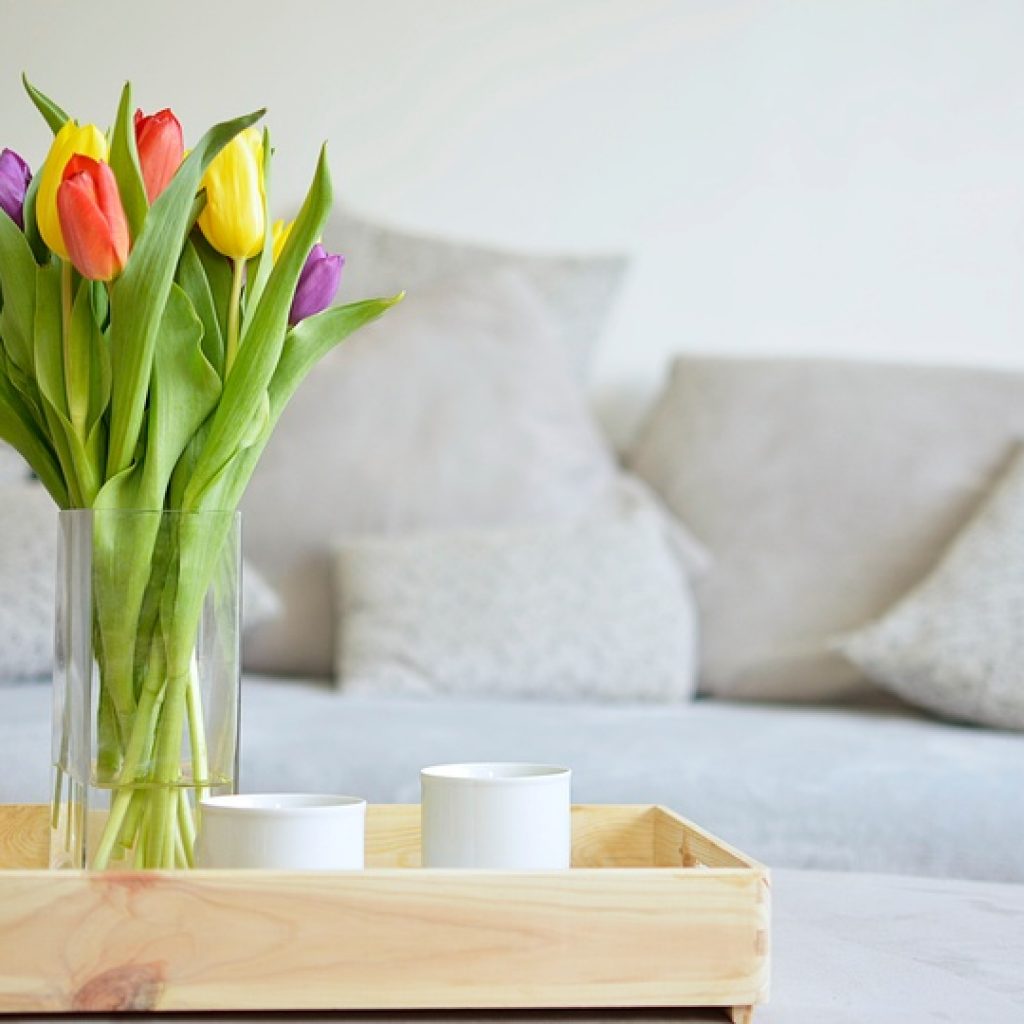 bouquet of tulips on a tray and in the background